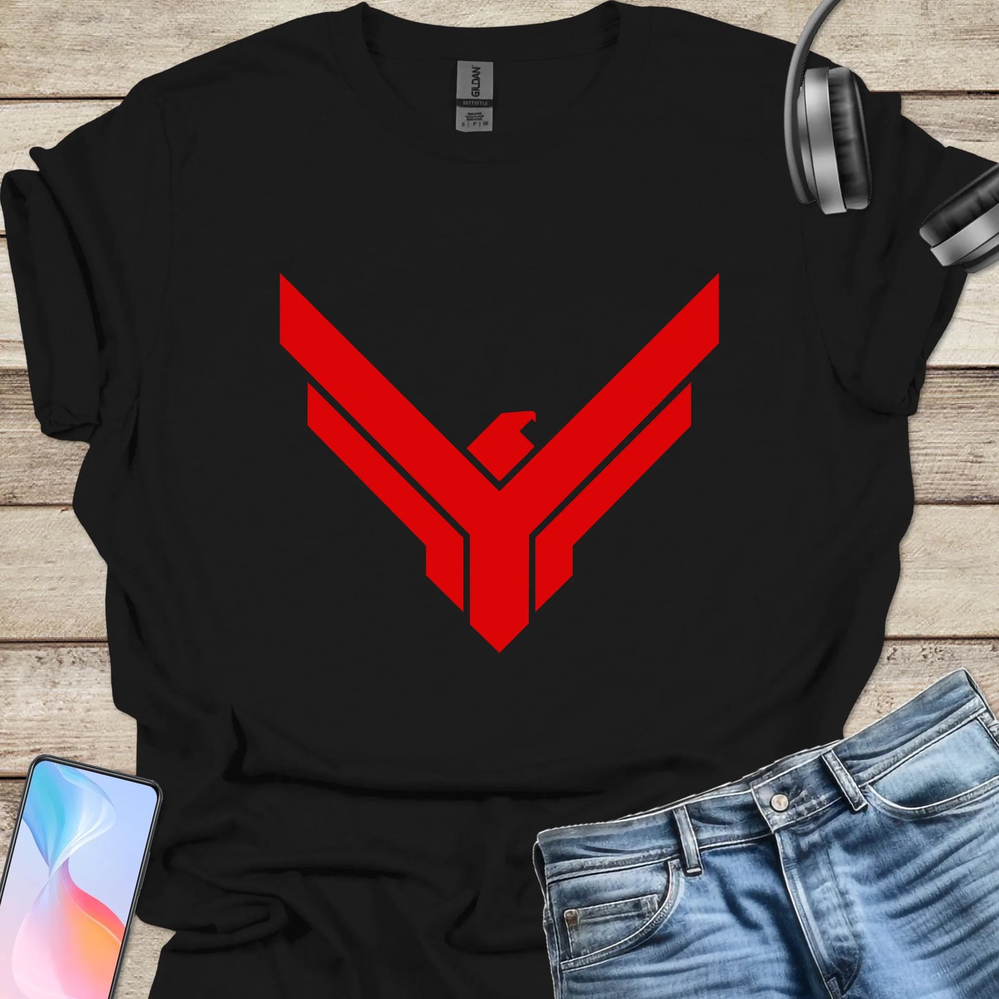 Black t-shirt featuring red Atreides hawk emblem from Dune universe